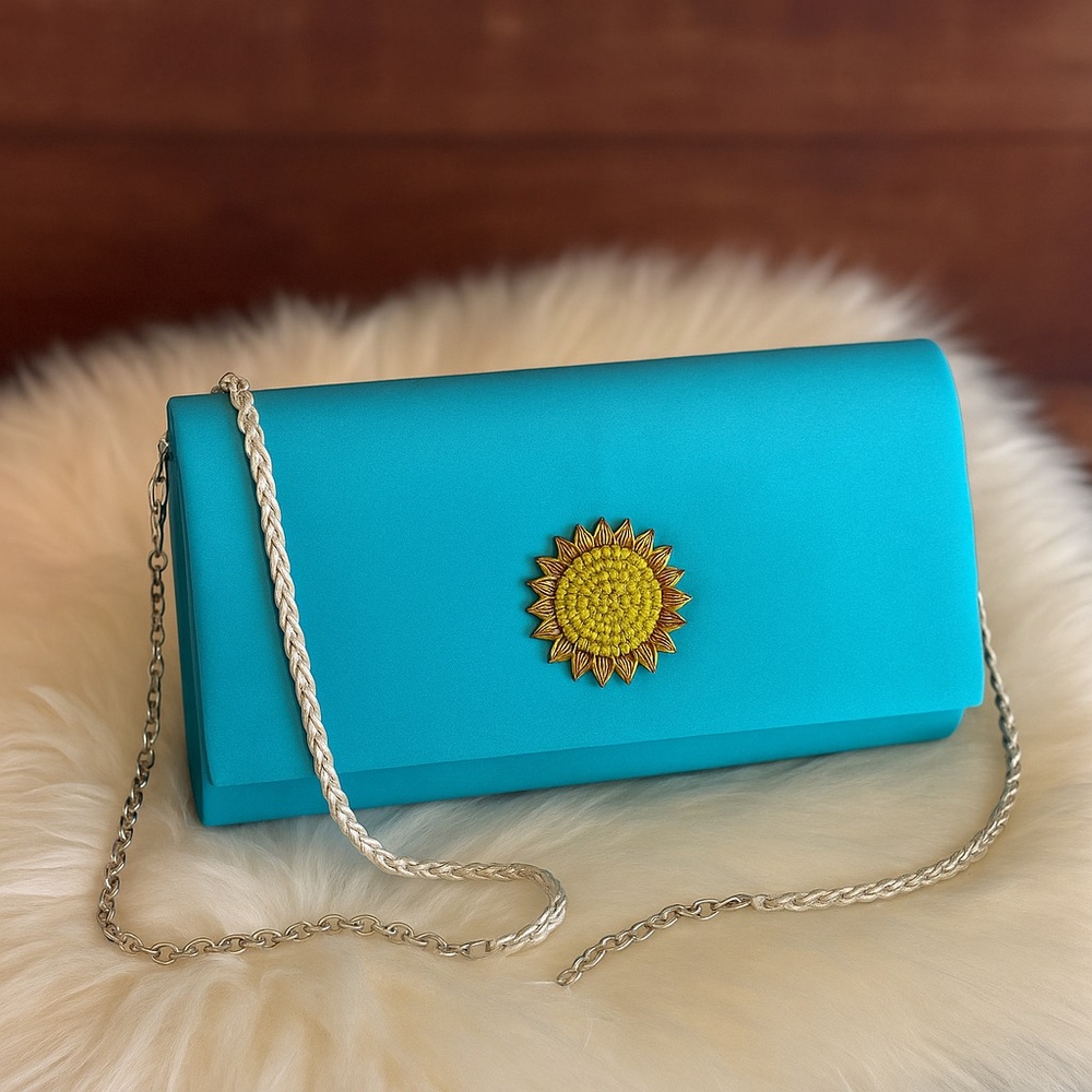 Nina Women’s Cielo Blue Satin Clutch Purse Sunflower Brooch Chain Strap